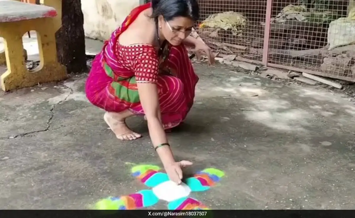 Woman Surprises Viewers By Creating Stunning Rangoli With Just Powder Throwing